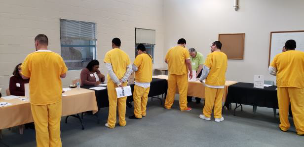 People in yellow jumpsuits